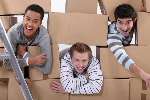 Boxes and furniture being loaded for a local Aldwych home move