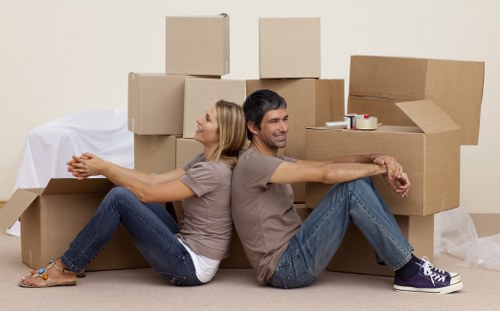 Packed boxes and furniture ready for a flat move in Aldwych